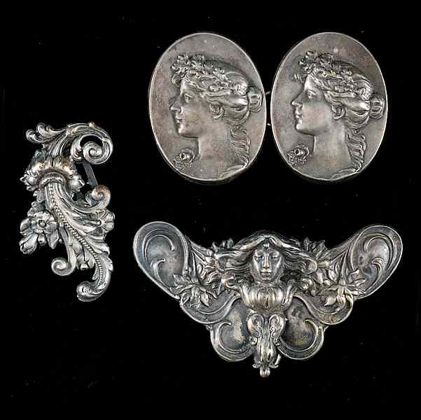 Appraisal: Unsigned Silver Clip Collection A grouping of two brooches and