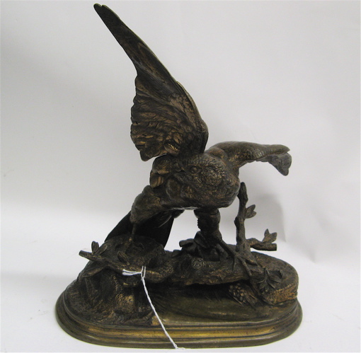 Appraisal: BRONZE PATINA METAL FIGURAL BIRD SCULPTURE a life-size bird having