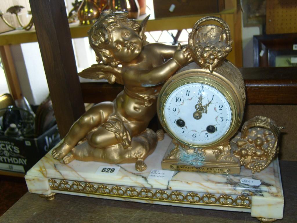 Appraisal: A th century marble and gilded mantle clock the circular