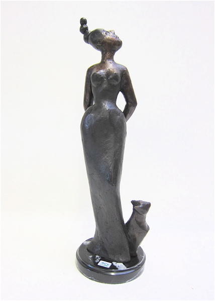 Appraisal: BRONZE MODERNISTIC STANDING FEMALE SCULPTURE with cat in a dark