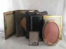 Appraisal: A mixed lot comprising seven photo frames including an oval