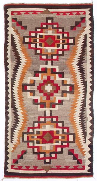 Appraisal: Weavings Centering three interlinked stepped diamond medallions within a sawtooth