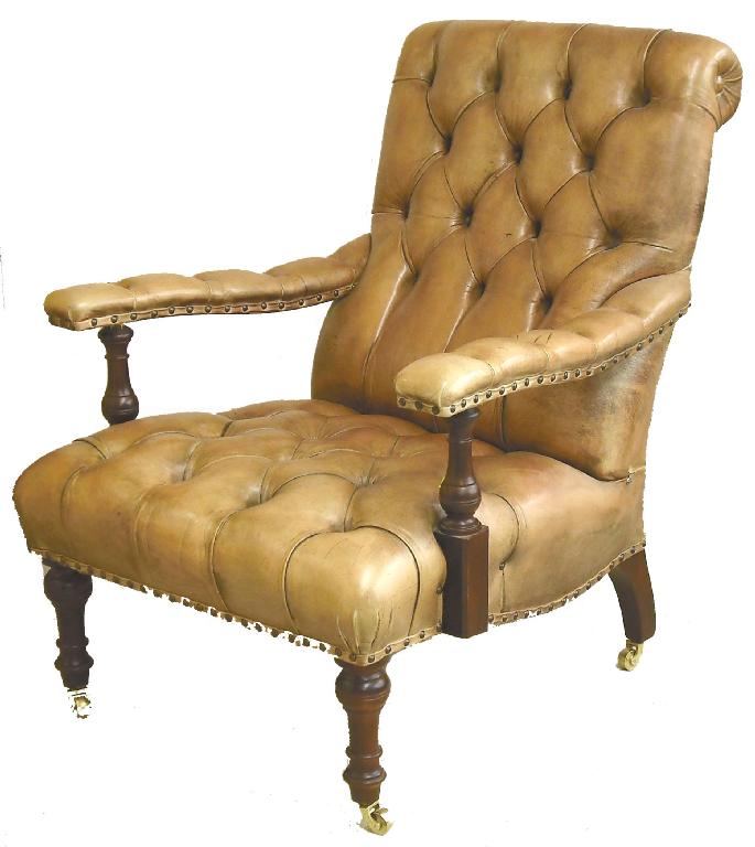 Appraisal: Victorian style mahogany pale pink leather button-back upholstered armchair upon