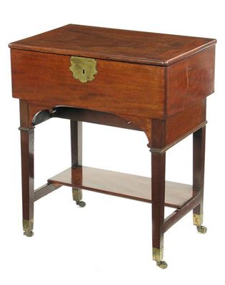 Appraisal: A George III mahogany campaign desk with brass mounts the