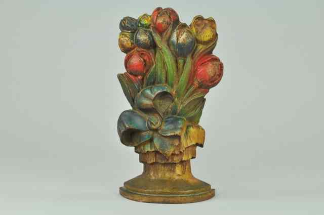 Appraisal: TULIPS WITH LARGE BOW DOORSTOP BOOK EXAMPLE cast iron beautifully