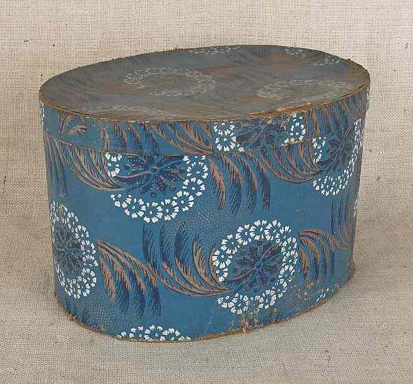 Appraisal: Wallpaper hat box th c with floral decoration on a