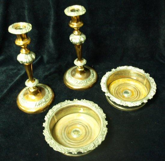 Appraisal: A pair of Sheffield plate candlesticks with shell on C