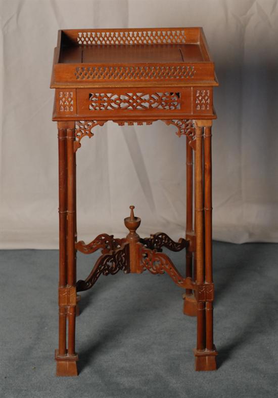 Appraisal: A Mahogany Chippendale-style Kettle Stand having a pierced gallery a