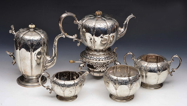 Appraisal: AN AMERICAN STERLING SILVER FIVE PIECE TEA SET a gourd