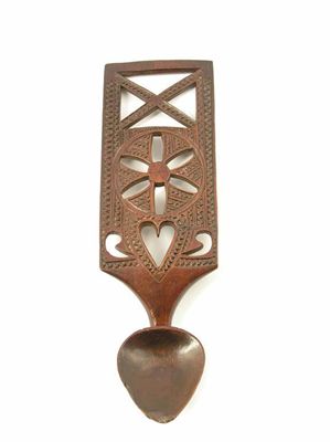 Appraisal: An early th century Welsh carved fruitwood love spoon having