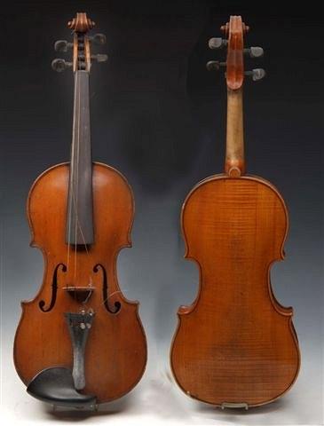 Appraisal: A VIOLIN with one piece back of golden brown colour