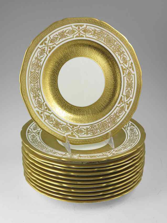 Appraisal: SET OF EMBOSSED GOLD RIM FINE CHINA SERVICE PLATES Triple