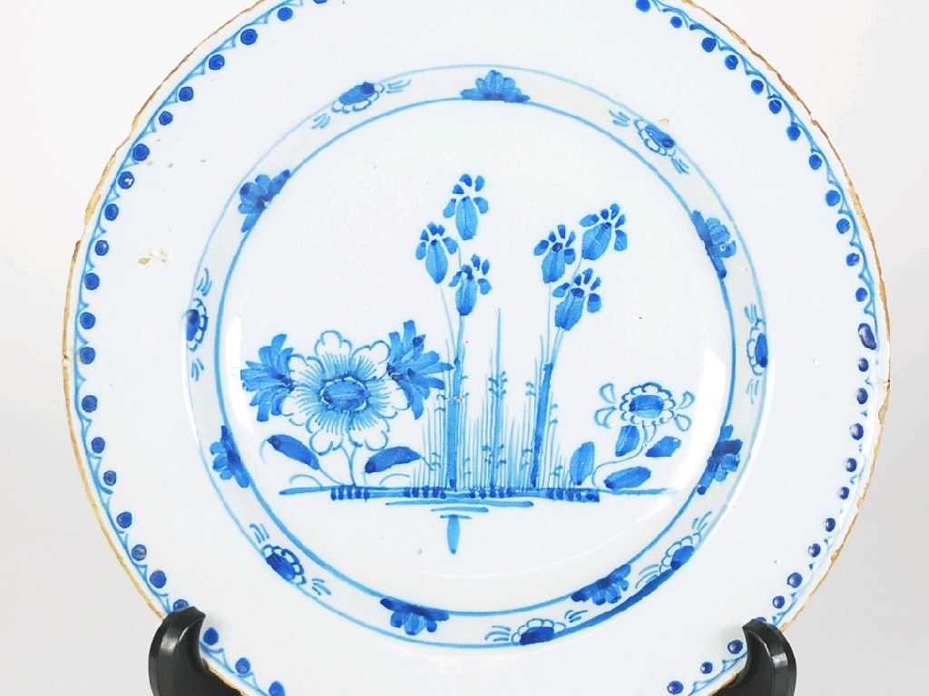 Appraisal: EIGHTEENTH CENTURY ENGLISH DELFT WARE BLUE AND WHITE CIRCULAR DISK