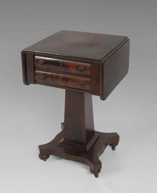 Appraisal: AMERICAN EMPIRE DRAWER WORK STAND Drop leaf drawer stand on