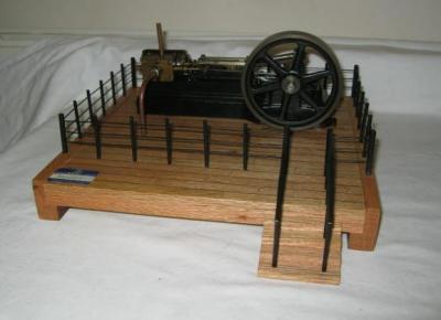 Appraisal: A Stuart model single cylinder mill engine bore fly wheel