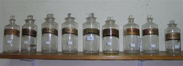 Appraisal: A COLLECTION OF NINE CLEAR VICTORIAN APOTHECARY JARS each with