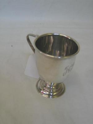 Appraisal: AN EDWARDIAN CHRISTENING MUG of tapering form with moulded rim