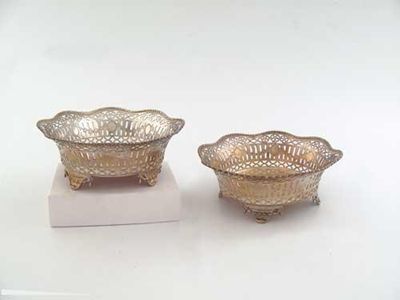 Appraisal: A pair of modern pierced bon bon dishes shaped circular