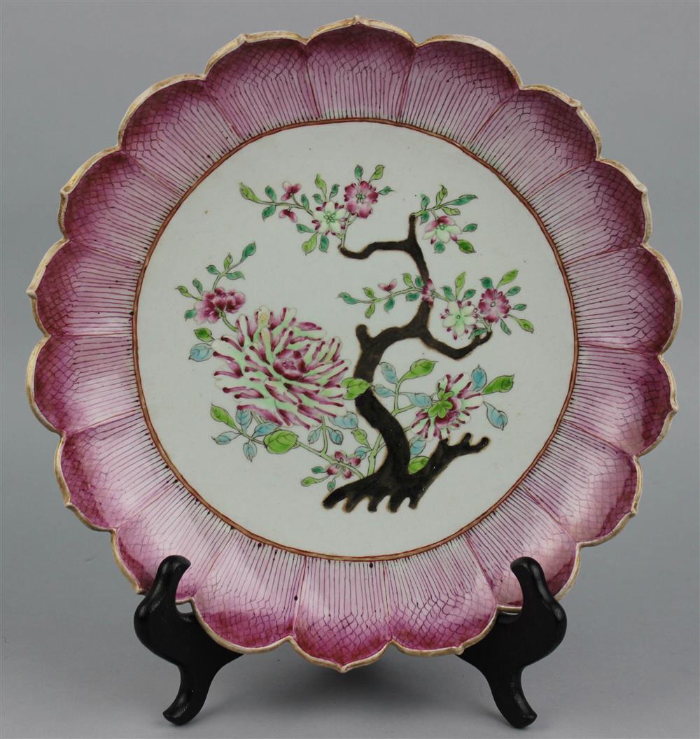 Appraisal: FAMILLE ROSE LOTUS BORDER PLATE SIX-CHARACTER GANGXU MARK IN IRON