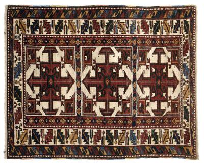 Appraisal: Caucasian rug three central panels with arrow and hook decoration