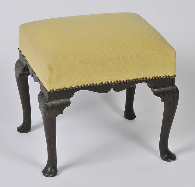 Appraisal: A GEORGIAN OAK STOOL with upholstered top and beaded border