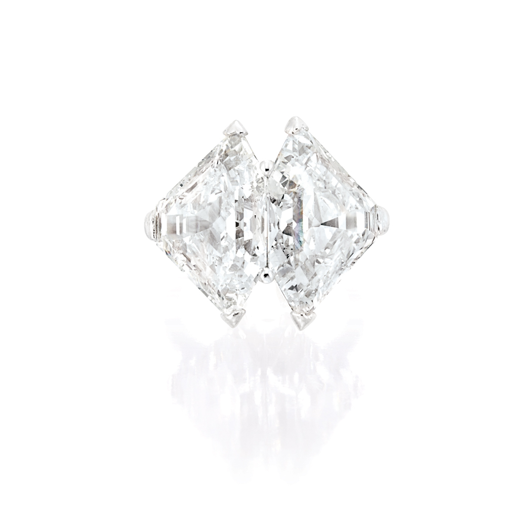 Appraisal: Platinum and Two-Stone Diamond Ring Centering two modified shield-shaped step-cut