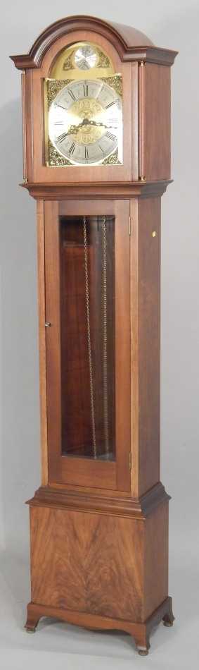 Appraisal: A modern walnut longcase clock with an arched brass dial