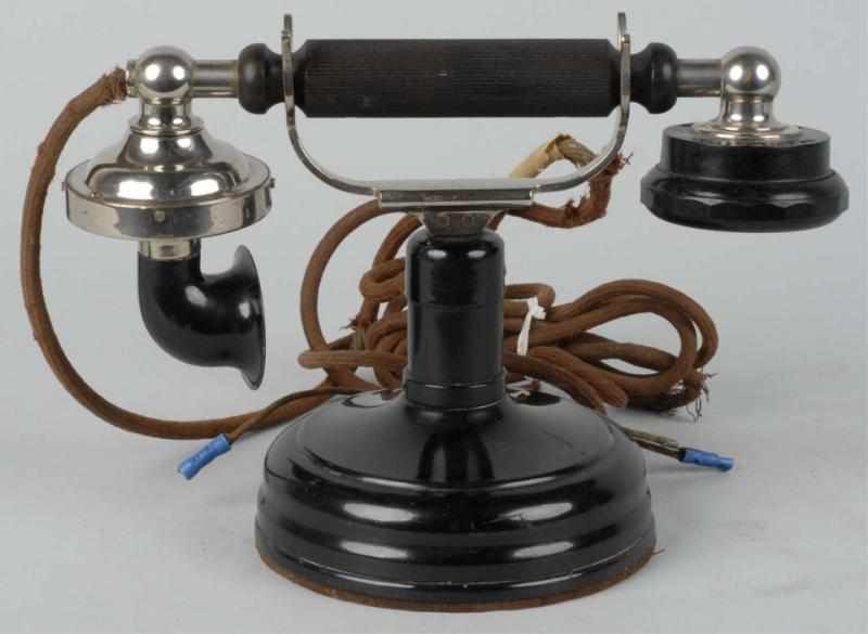 Appraisal: Kellogg Non-Dial Grab-a-Phone Telephone Description Circa Black paint nickel cradle