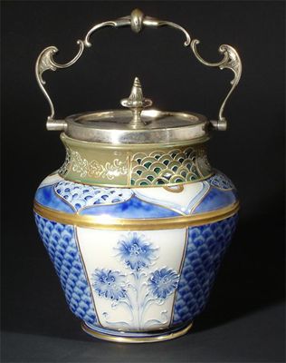 Appraisal: A James Macintyre Gesso Faience biscuit barrel and cover with