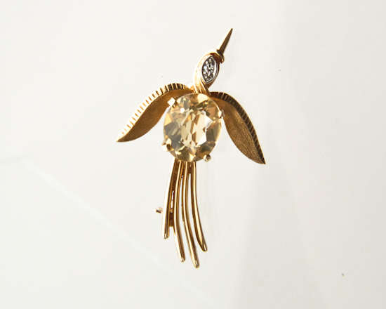 Appraisal: A Gold Citrine and Diamond Flying Bird Brooch K marked