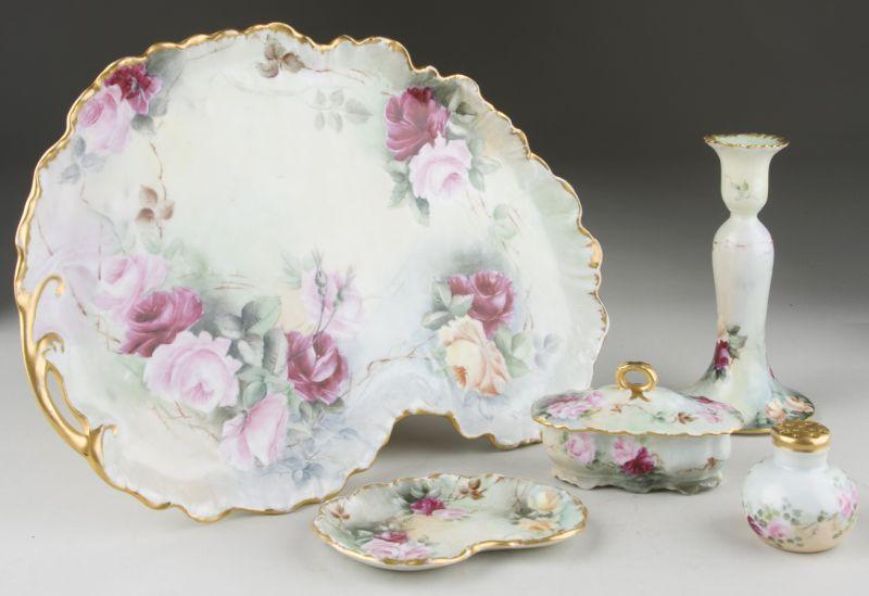 Appraisal: Limoges Hand-Painted Porcelain Dresser Set pieces including Rococo style tray