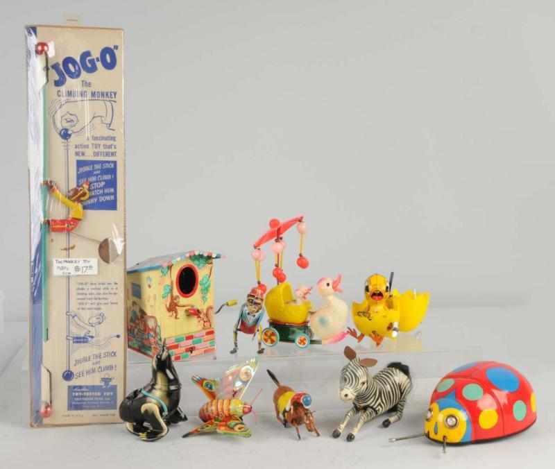 Appraisal: Lot of Tin Animal Friction Wind-Up Toys Description Chinese and