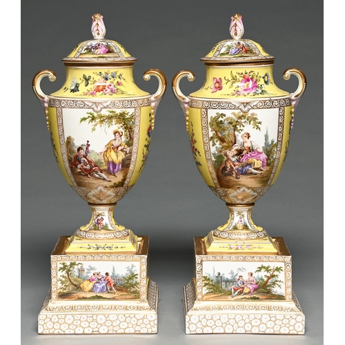 Appraisal: A pair of German yellow ground shield shaped vases covers