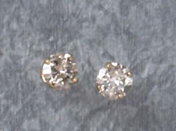 Appraisal: DIAMOND STUD EARRINGS k yellow gold pierced earrings set with