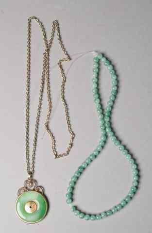 Appraisal: Jade Jewelry ItemsOne is a bead necklace in a pale