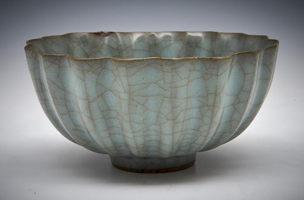 Appraisal: Longquan Guan-Type Chrysanthemum Bowl Longquan Guan-Type Chrysanthemum Bowl The rounded