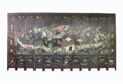 Appraisal: A large Chinese black lacquered coromandel twelve panel screen carved