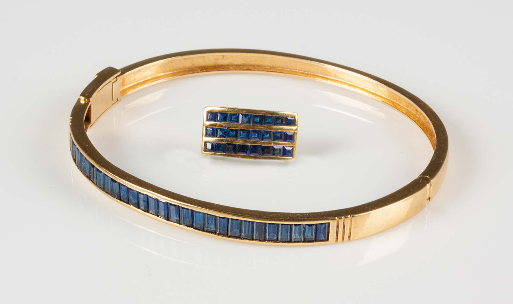 Appraisal: K Gold Blue Sapphire Bracelet Pendant Bracelet baguette cut sapphires