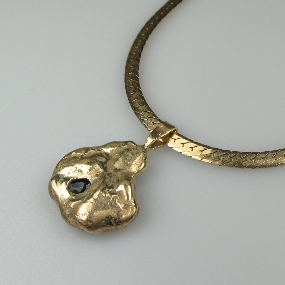 Appraisal: k Yellow Gold Nugget Pendant set with a small oval