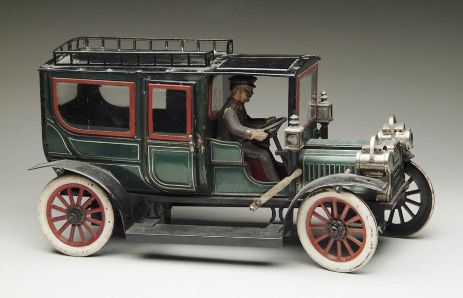 Appraisal: LARGE CARETTE LIMOUSINE Impressive green lithographed car with black enameled