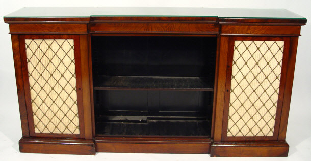 Appraisal: th Century rosewood inverted breakfront bookcase fitted with a pair