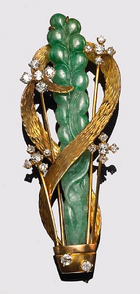 Appraisal: A jadite jade diamond and k gold brooch estimated total