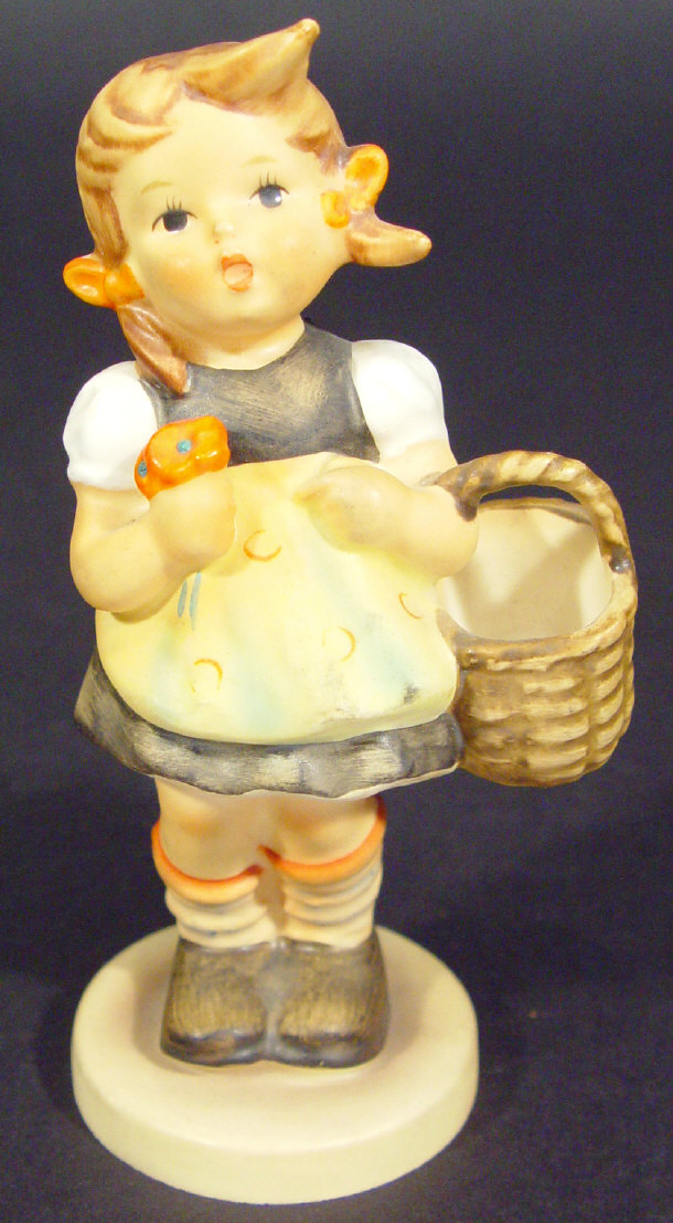 Appraisal: Hummel china figurine of a young girl with basket factory