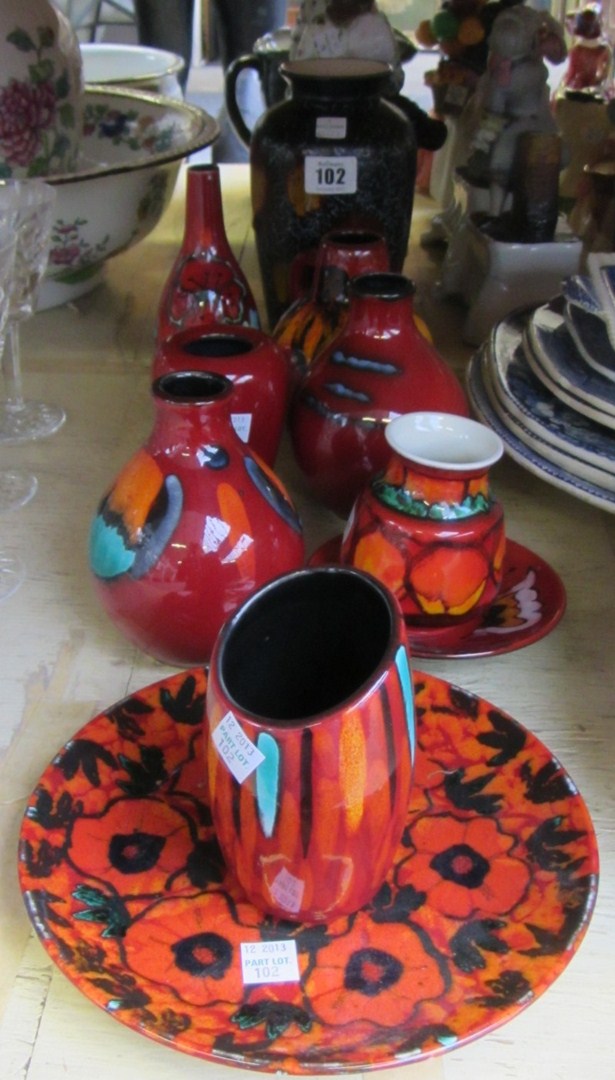 Appraisal: Seven small Poole pottery vases a small dish and a