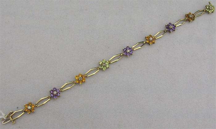 Appraisal: CITRINE AMETHYST PERIDOT DIAMOND AND TEN KARAT GOLD BRACELET -