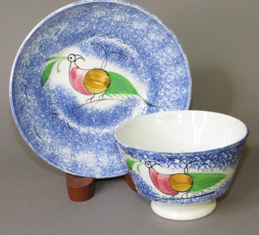 Appraisal: BLUE SPATTER CUP SAUCER PEAFOWL PATTERNca all over blue spatter