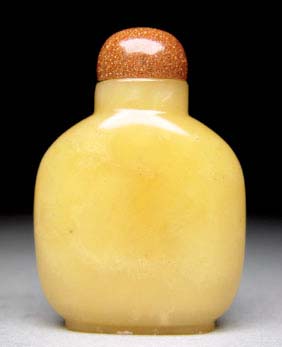 Appraisal: ANTIQUE JADE OR HARDSTONE SNUFF BOTTLE Finely hollowed and antique