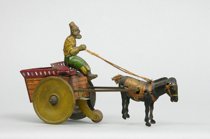 Appraisal: An Antique Strauss Wind-up Toy Man in wagon mule goes