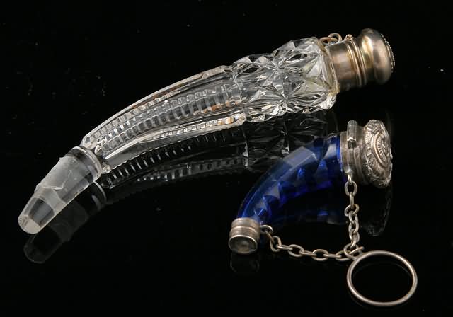 Appraisal: Cobalt blue vial with chased silver top and chain paired