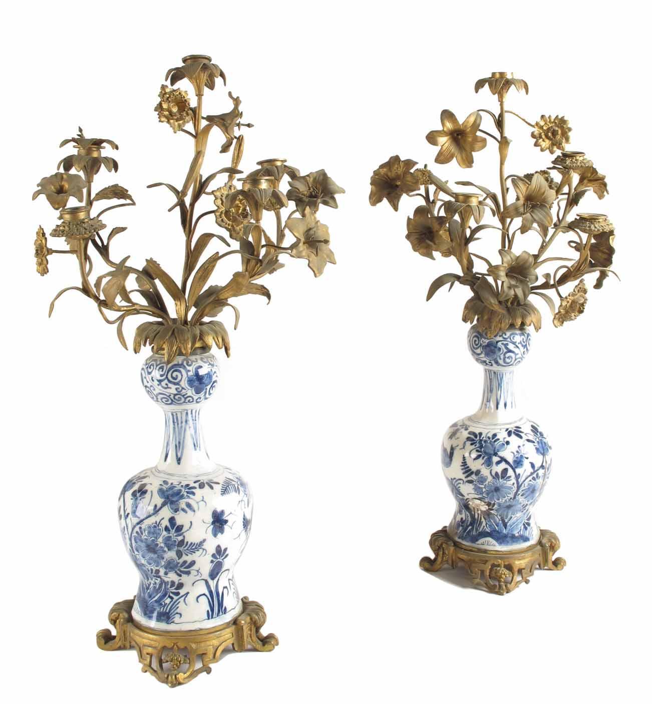 Appraisal: A pair of th century delft and gilt metal five